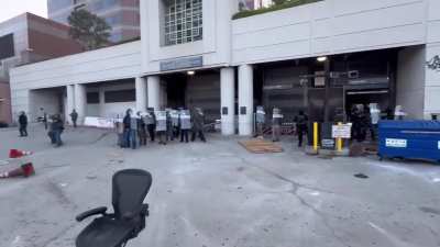 Ice Agent Body Checks A Protester Face Forward Into Concrete As His Support Indiscriminately fires less lethal on protesters