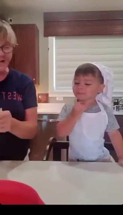 Tough work to cook with a kid