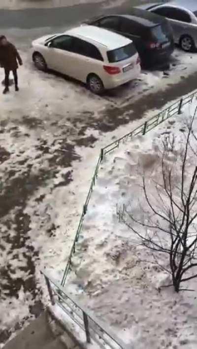 A guy jumped off a roof and hit a manhole.