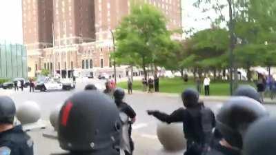 Cops kill old man by pushing him.