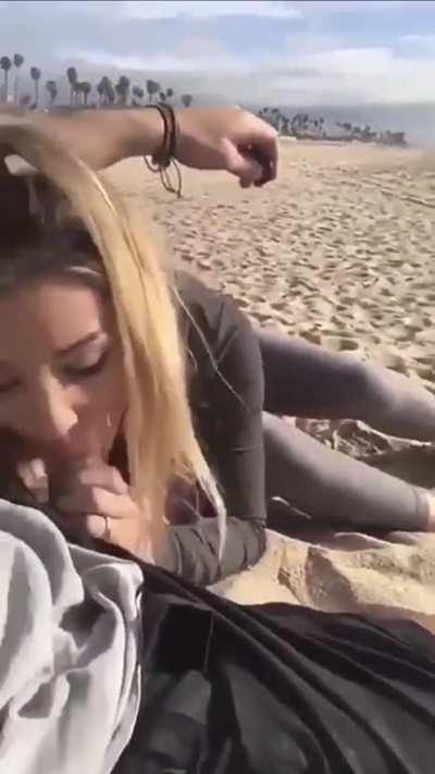 Sucking cock on the beach