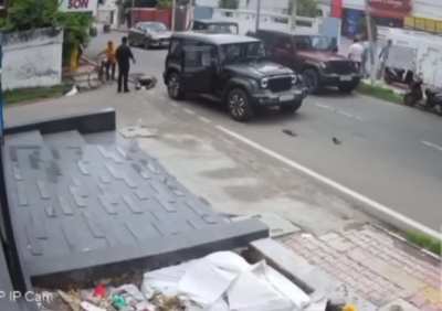 Driver mows down scooter rider, then backs up like it's GTA