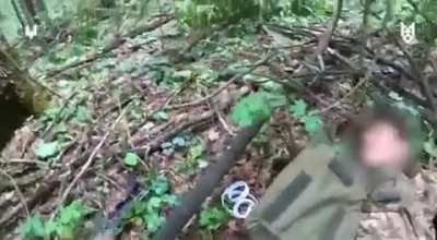 First-person footage shows Ukrainian Special Forces assaulting a small Russian unit that is attempting to advance through a forest to take a new position. The soldiers also use this opportunity to gather intelligence and search the bodies for orders and m