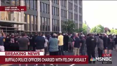 Buffalo Cops applauding and cheering their fellow officers who were charged with felony assault for pushing a 75 year old man.