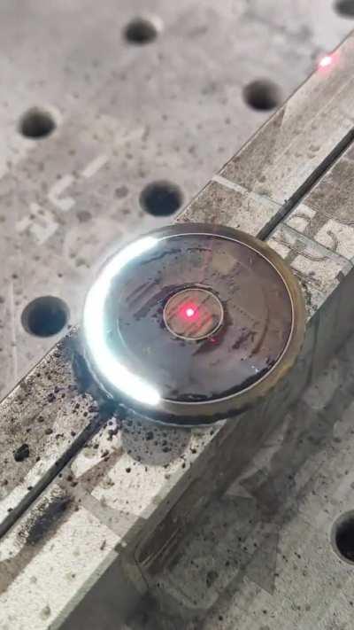 Laser cleaning a coin, with water added (listen for sound!)