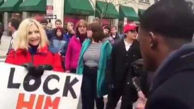 Black guy confronts white BLM protester