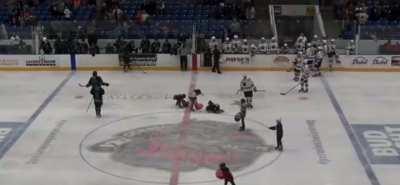 Line Brawl in NAHL game between the Odessa Jackalopes and Shreveport Mudbugs. Both coaches ejected, fights started in the middle of a line change so 7 players on the ice for both sides.