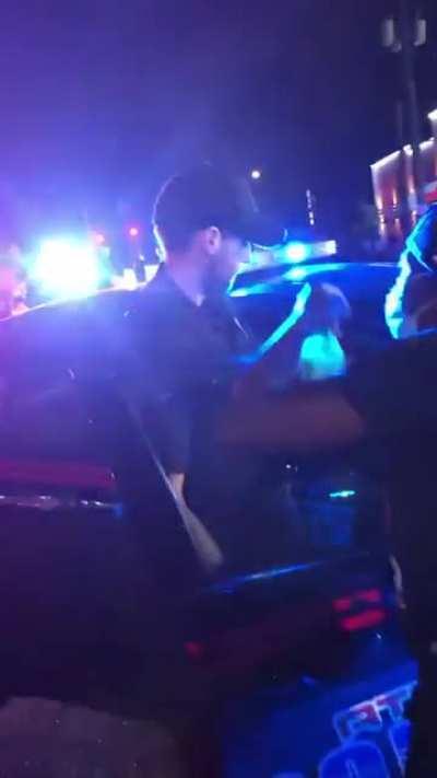 Police officers in Atlanta try to investigate a shooting