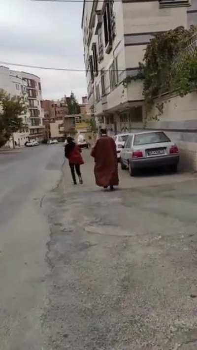 In response to the brutal crack down of the women protesters in Iran by Islamic regime, young Iranians knock down the Mullah's Turban on the streets