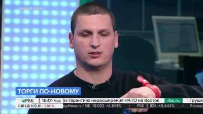 During Live feed on Russian TV the stock exchange expert drank and cheered to the death of the Russian stock market and said that he would go to work as Santa Claus.