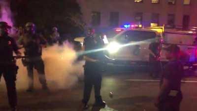 Police tear gassing peaceful protesters in Denver