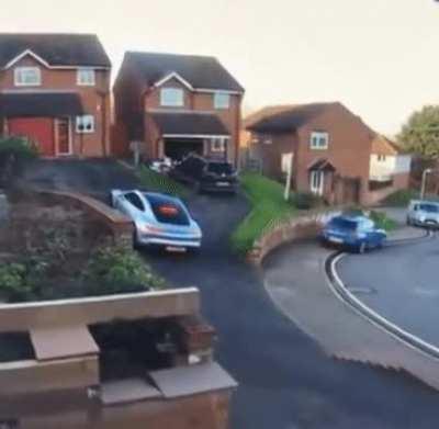 Pulling the new Porsche into the driveway