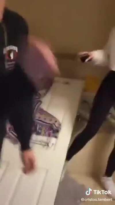 Guys tries to open a locked door