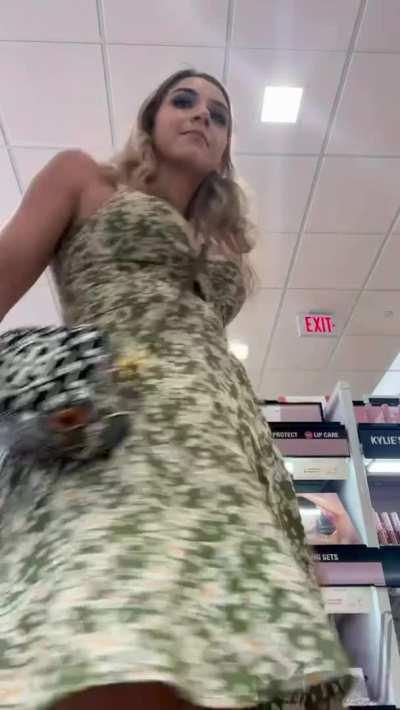 The store was super crowded but I still insisted on showing off my holes for you :) [GIF]