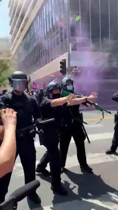 Los Angeles 7/17/21: LAPD officer shoots a less-than-lethal munition at a protester for no reason