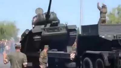Alternate angle of a T-34 overturning while being loaded onto a truck following the Battle of Kursk 75th anniversary parade - August 2018