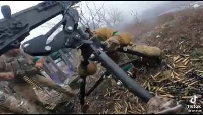 Ukrainian Soldiers Using an M2 Browning to the Maximum