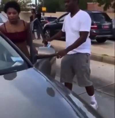 Road Rage: Woman smashes bus window and proceeds to drive off with bus driver on car