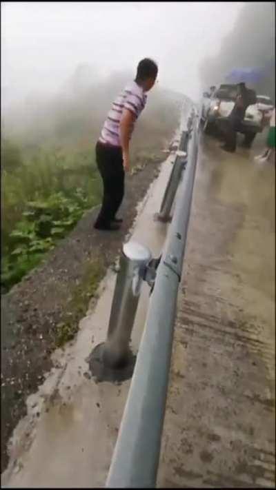 The way this guy clears out all the snakes from getting on the road