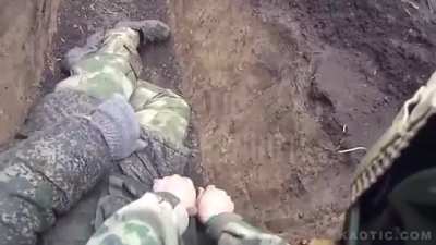 Russian Medic Helping Wounded Soldier Hit By Drone
