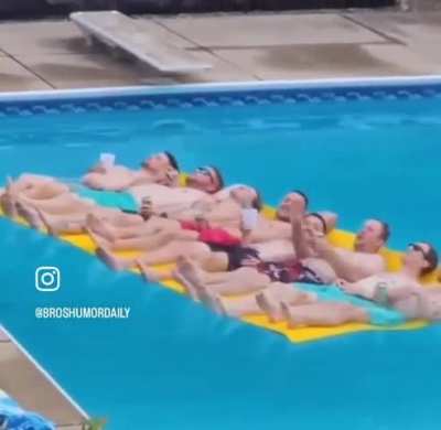 Just a couple of dudes chilling in a pool