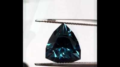London Blue Topaz 7.51cts 13.64x11.53mm. This is Brazil rough and like nearly all blue Topaz it's irradiated. Cut in the Pat's Point design, which always looks like a Star Trek badge to me :-) Reg $375 USD sub price $345 USD plus shipping.