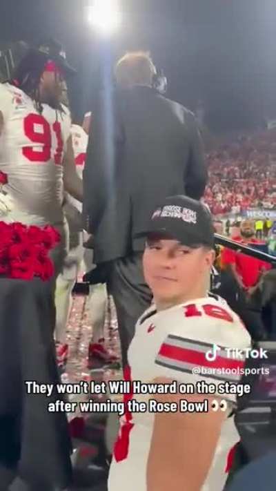 Frustration builds at the Rose Bowl ceremony when a guy won’t let the winning quarterback join the team on stage. 