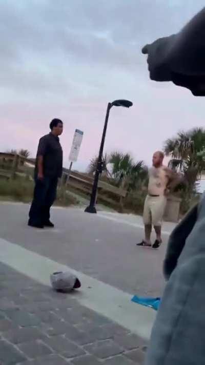 Crackhead leprechaun spits on another man and gets put to sleep