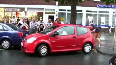 You don't ask for drunk football fans to cheer you on while parking in a small spot, they just appear when you need them the most.