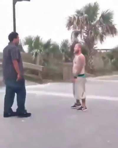 Man gets choked out after he spits