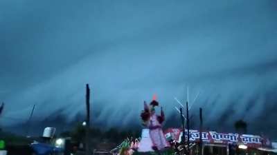 A heavy rainfall accompanied by towering clouds that resembled a tsunami in Roorkee, India.