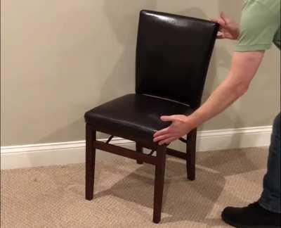 perfectly balancing a chair on a flat surface