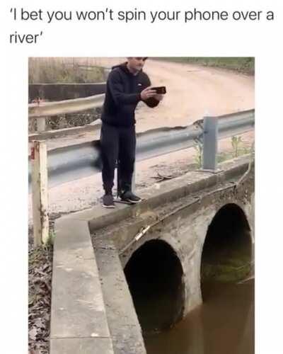 Spinning your phone over a river for attention/fame