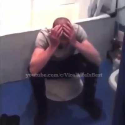 Bro puts an explosive under a container and sits on it