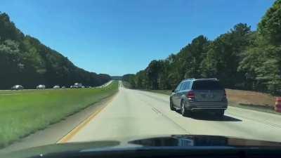 Guy got mad because I used my washer fluid while he was tailing me, then he did this.