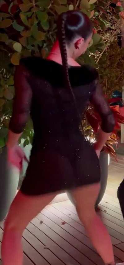 Close up dancing in see through dress