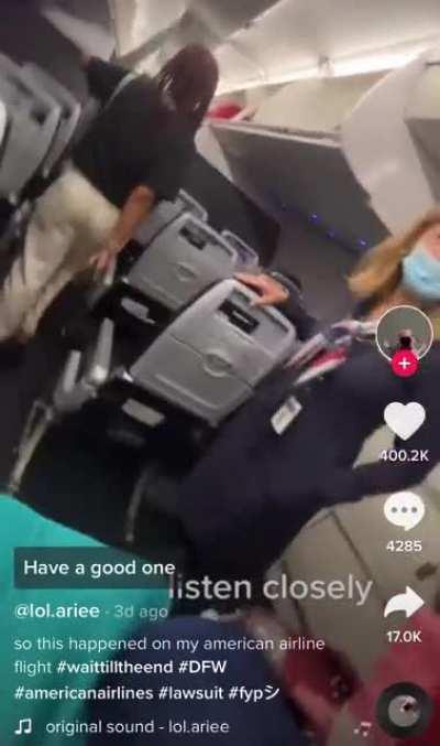 American Airlines flight crew duct taped a woman to her seat to stop her from trying to open the plane door while in flight