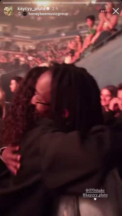 Kaycyy Pluto greeting Shake as she leaves the stage after performing with Swedish House Mafia in New York