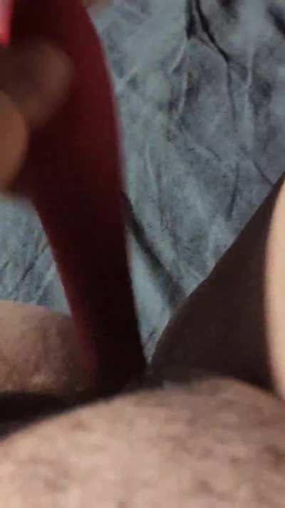 Wife playing with her toy 