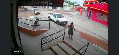 Lady on sidewalk gets hit by a car