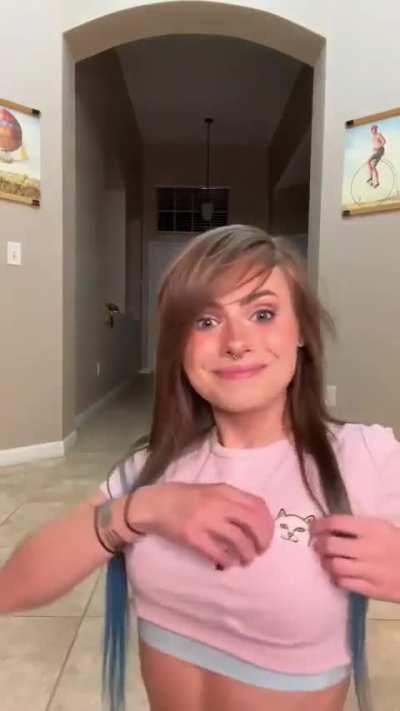 You probably only noticed the titty kitty, so I'm just letting you know there is also a fork being used as a bracelet.