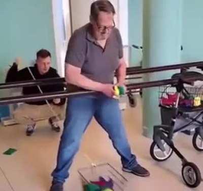 This guy who is a social worker, coach and fitness instructor brings fun games for the residents of this nursing home...