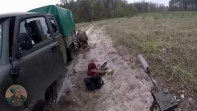 RU pov: GoPro footage of RU soldiers ambushing a UA ammunition truck, killing multiple UA soldiers. Archival footage from November 2022.