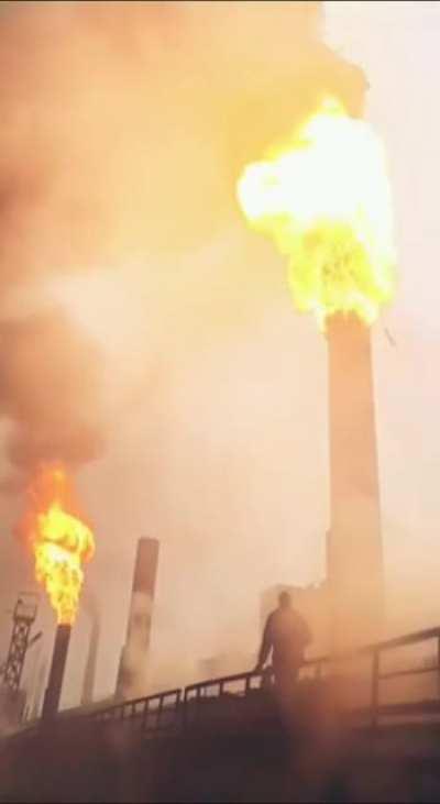 Lighting up a smoke stack with a molotov cocktail