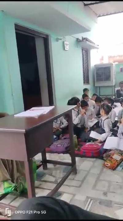 Teacher allowing students to beat the kid just cause of his religion. 