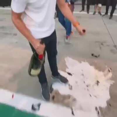 Lando Norris dies slightly while celebrating.