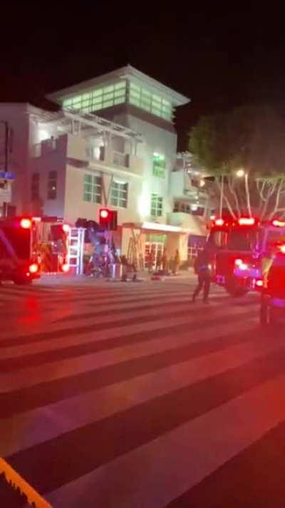 [OC] Idiot kid was drifting recklessly on top of the building, lost control and flew into the McDonald’s across the street. Lucky idiot because there were no injuries.