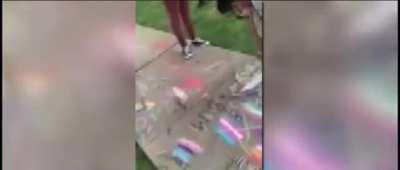 Teacher writes ‘Heteros Rule’ over students’ gay pride chalk art