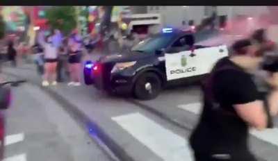 Pigs in Downtown spray mace for no reason