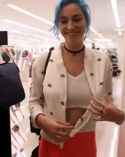 Blue hair girl flashing while shopping